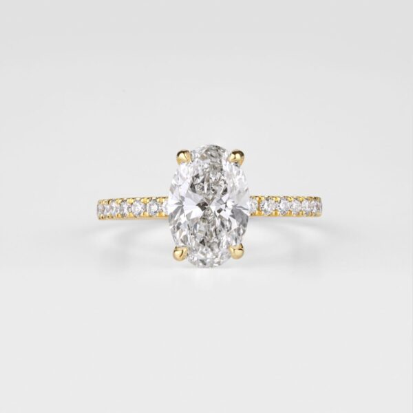 Oval diamond solitaire ring in yellow gold